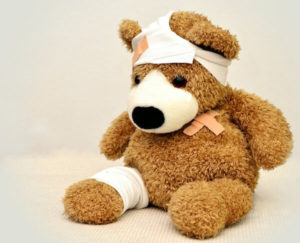 picture of sad bruised teddy bear